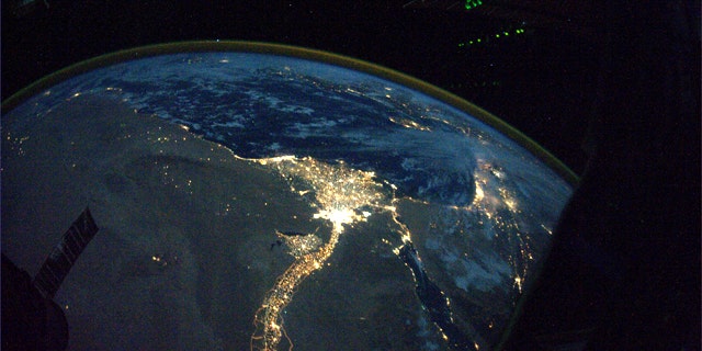 This image provided by NASA and posted to Twitpic by astronaut Douglas Wheelock on Oct. 31, 2010 shows a night view of the Nile River winding up through the Egyptian desert toward the Mediterranean as seen from the International Space Station.