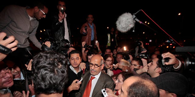Jan. 27, 2011: Former Director General of the International Atomic Energy Agency, IAEA, and Nobel Peace Prize winner Mohamed ElBaradei talks to members of the media as he arrives at Cairo's airport in Egypt, from Austria. ElBaradei told reporters that the regime has not been listening. He urged the Egyptian regime to exercise restraint with protesters, saying they have been met with a good deal of violence which could lead to an explosive situation. (AP)