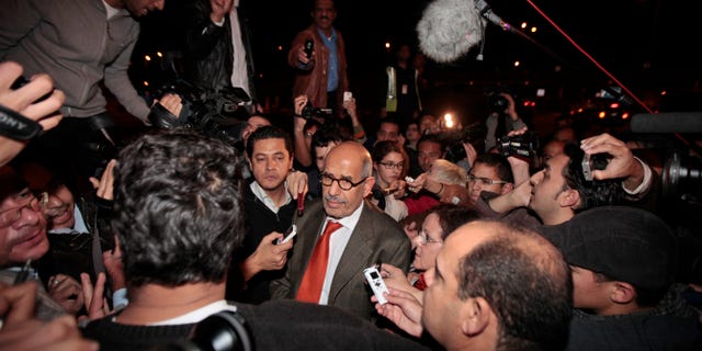 Jan. 27, 2011: Former Director General of the International Atomic Energy Agency, IAEA, and Nobel Peace Prize winner Mohamed ElBaradei talks to members of the media as he arrives at Cairo's airport in Egypt, from Austria. ElBaradei told reporters that the regime has not been listening. He urged the Egyptian regime to exercise restraint with protesters, saying they have been met with a good deal of violence which could lead to an explosive situation. (AP)