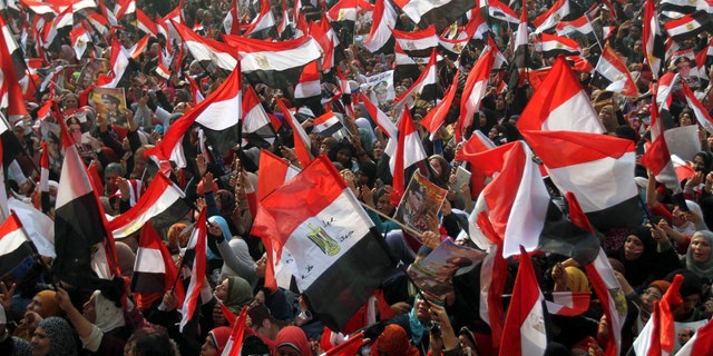 Jan. 25, 2014: Supporters of Egypt';s army and police gather at Tahrir square in Cairo, on the third anniversary of Egypt's uprising.
