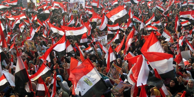 Jan. 25, 2014: Supporters of Egypt';s army and police gather at Tahrir square in Cairo, on the third anniversary of Egypt's uprising.