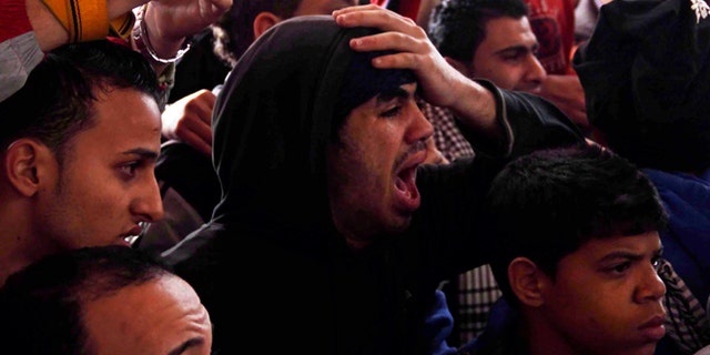 Jan. 26: Families and supporters of those accused of soccer violence from the Port Said soccer club react to the announcement of verdicts for 21 fans on trial in last years Port Said stadium incident which left 74 people dead, in Port Said, Egypt.