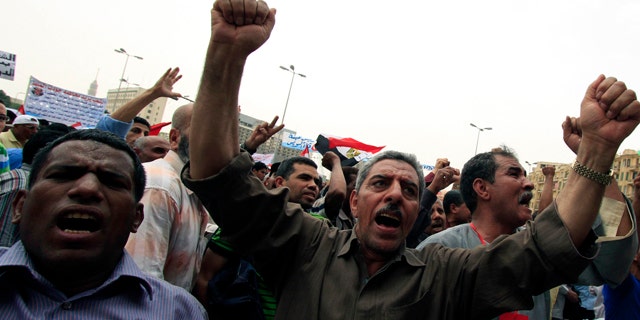 May 27: Egyptian protesters chant slogans as they attend a rally in Tahrir square in Cairo, Egypt. Activists are pressing Egypt's military rulers to investigate accusations of sexual abuses against protesters.