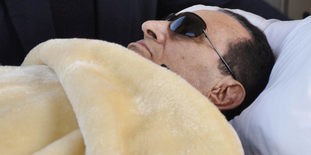 FILE: Former Egyptian President Hosni Mubarak is wheeled into court in Cairo, Egypt.