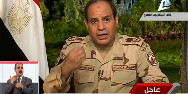 March 26, 2014: In this image made from video broadcast on Egypt's State Television, Egypt's military chief Abdel-Fattah el-Sissi speaks in a nationally televised speech, announcing that he will run for president, in Cairo, Egypt.