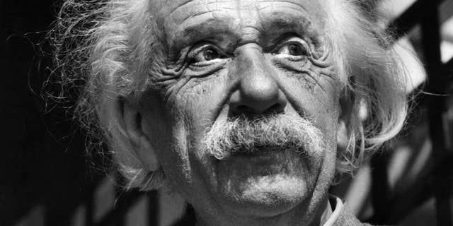 FILE - This June, 1954, file photo shows renowned physicist Albert Einstein in Princeton, N.J. Einstein was a father who worried his son wasn't taking his geometry studies seriously enough, and that he was indebted to a favorite uncle for giving him a toy steam engine when he was a boy, launching a lifelong interest in science. He also believed the infidelity of a friend's spouse was no big deal. These and other reflections, including personal opinions on God and politics, are contained in 27 letters being offered by a private collector at auction this week. (AP Photo, File)