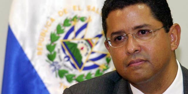 FILE - In this Jan. 13, 2005 file photo, former President of El Salvador Francisco Flores announces his candidacy for Secretary General of the Organization of American States (OAS) at the presidential house in San Salvador, El Salvador. El Salvador's top prosecutors are seeking on Wednesday, April 30, 2014 the arrest of Flores, who is accused of embezzlement, illegal enrichment and disobedience. (AP Photo/Luis Romero, File)