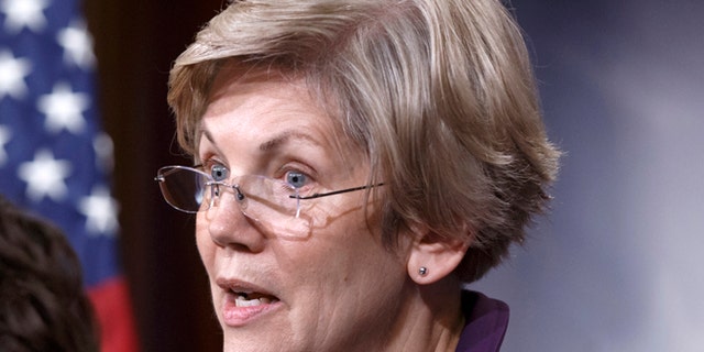 In this Dec. 10, 2014 file photo, Sen. Elizabeth Warren, D-Mass., speaks on Capitol Hill in Washington.