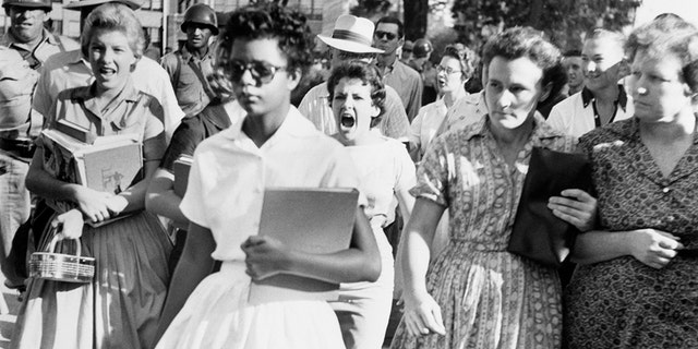 Elizabeth Eckford was one of the nine  students whose integration into Little Rock's Central High School was ordered by a Federal Court following legal action by NAACP.