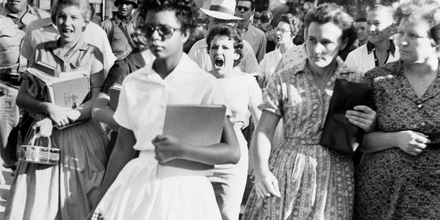 Elizabeth Eckford was one of the nine students whose integration into Little Rock's Central High School was ordered by a Federal Court following legal action by NAACP.