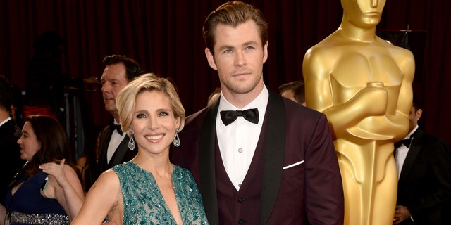 HOLLYWOOD, CA - MARCH 02:  Actors Elsa Pataky (L) and Chris Hemsworth attend the Oscars held at Hollywood &amp; Highland Center on March 2, 2014 in Hollywood, California.  (Photo by Frazer Harrison/Getty Images)