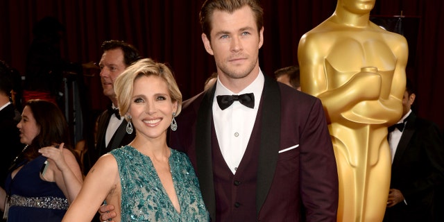 HOLLYWOOD, CA - MARCH 02: Actors Elsa Pataky (L) and Chris Hemsworth attend the Oscars held at Hollywood & Highland Center on March 2, 2014 in Hollywood, California. (Photo by Frazer Harrison/Getty Images)