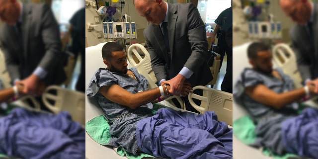 Police used murdered Officer Michael Chesna's handcuffs to restrain the suspected killer.