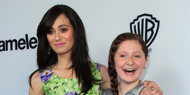 "Shameless" stars Emmy Rossum, left, and Emma Kenney, right, in 2013. Rossum is leaving the show after the ninth season.