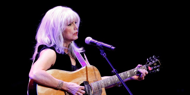 Singer Emmylou Harris performs during the 'A Celebration of Paul Newman's Hole in the Wall Camps' fundraising concert in New York October 21, 2010.