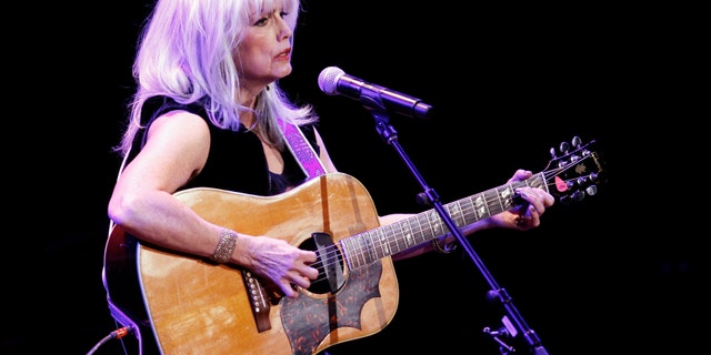 Singer Emmylou Harris performs during the 'A Celebration of Paul Newman's Hole in the Wall Camps' fundraising concert in New York October 21, 2010.