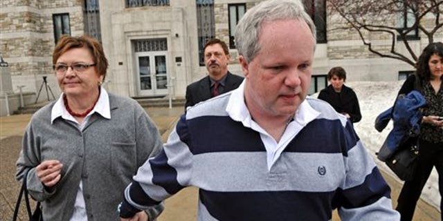 Feb. 17: William Melchert-Dinkel leaves the Rice County Courthouse holding hands with his wife, Joyce Melchert-Dinkel, after waiving his right to a jury trial in Faribault, Minn. (AP/Star Tribune)