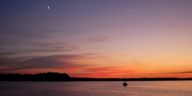 This image provided by The National Trust for Historic Preservation shows the lower James River in James City county, Va. Americaâs first permanent English settlement at Jamestown was founded along the banks of the James River in 1607. Now preservationists say the river and landscape are threatened by a proposed transmission line that would change the scenic integrity of the area and that is what led to the site being on the trusts 2013 list of 11 Most Endangered Historic Places. (AP Photo/The National Trust for Historic Preservation)