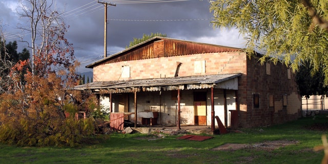This image provided by Rick Ing and released by The National Trust for Historic Preservation, shows the rear of the Chinatown House in Rancho Cucamonga, Calif. The house is one of the last remaining connections to the history of Chinese Americans who helped build modern-day Rancho Cucamonga, leading to it being placed on the trusts 2013 list of 11 Most Endangered Historic Place. It once served as a general store and residence for about 50 Chinese American laborers. (AP Photo/Rick Ing, The National Trust for Historic Preservation)