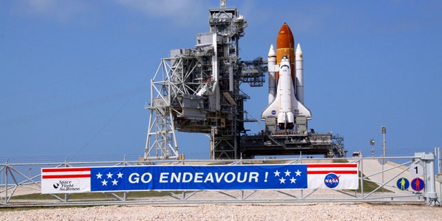 Space shuttle Endeavour glistens in the sun on Launch Pad 39A at NASA's Kennedy Space Center in Florida. The shuttle is launching on its final mission, STS-134, on April 29, 2011.