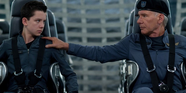 This image released by Summit Entertainment shows Asa Butterfield, left, and Harrison Ford in a scene from "Ender's Game."