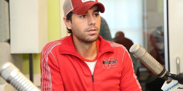 Enrique Iglesias visits "The Elvis Duran Z100 Morning Show" at Z100 Studio on July 18, 2013 in New York City.