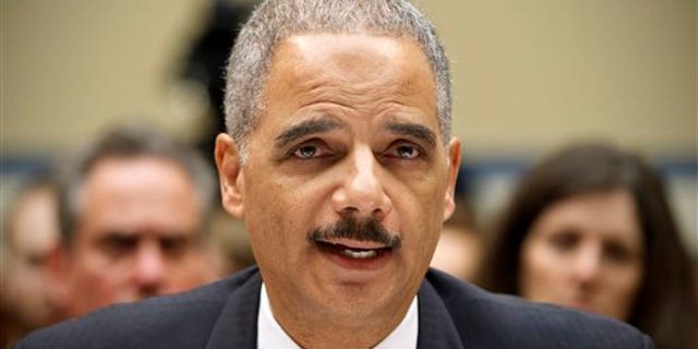 Feb. 2, 2012: Attorney General Eric Holder testifies on Capitol Hill in Washington before the House Oversight and Government Reform Committee hearing on "Operation Fast and Furious."