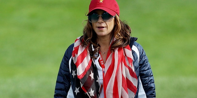 Herman was first spotted with Woods at the Presidents Cup last year.