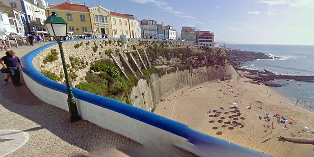 A cell phone belonging to one of the couple was found at the top of the wall after they fell some time between 1am and 6am Tuesday