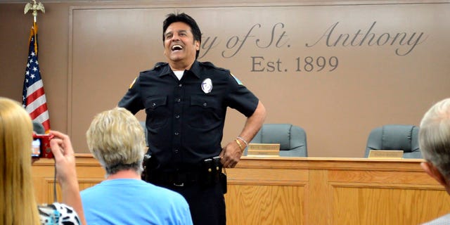 In this Saturday, July 2, 2016, photo famed "CHiPs" police officer Erik Estrada mets St. Anthony residents to discuss his efforts with the St. Anthony Police Department to stop internet enticement of children at St. Anthony City Hall. Estrada has spent the past decade working with various law enforcement departments to keep kids safe online. Following his induction Estrada as a now a St. Anthony Police Department reserve officer, he told how important it is to teach children what not to do while on the web. (Lisa Dayley-Smith/Rexburg Standard Journal via AP) MANDATORY CREDIT