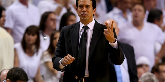MIAMI, FL - JUNE 20: Head coach Erik Spoelstra of the Miami Heat calls out in the third quarter while taking on the San Antonio Spurs during Game Seven of the 2013 NBA Finals at AmericanAirlines Arena on June 20, 2013 in Miami, Florida. NOTE TO USER: User expressly acknowledges and agrees that, by downloading and or using this photograph, User is consenting to the terms and conditions of the Getty Images License Agreement. (Photo by Mike Ehrmann/Getty Images)