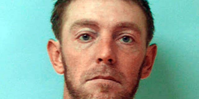 This undated photo provided by the Armstrong County Jail shows Robert Crissman. Armstrong County officials say Crissman ran from jail Thursday morning, July 30, 2015, while delivering meals to other inmates. Authorities say Crissman is suspected of killing a woman in her Kittanning, Pa., home and then taking her 1999 Chevrolet Silverado pickup truck after escaping. (Armstrong County Jail via AP)