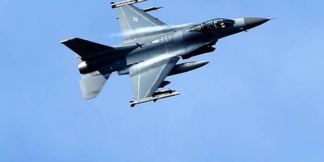 April 8, 2015: A U.S. military fighter jet participates in a NATO Baltic Air Policing Mission practice mission in the Tapa training area, some 43 miles southwest of Tallinn, Estonia.