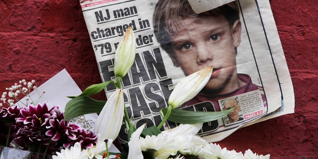 FILE - This May 28, 2012, file photo shows a newspaper with a photograph of Etan Patz that is part of a makeshift memorial in the SoHo neighborhood of New York. Jury selection is set to start Monday, Jan. 5, 2015, in Hernandezâs murder trial. As the murder case surrounding Patz' notorious 1979 disappearance heads to trial, missing-childrenâs advocates see it as proof that such cases still can be pursued after decades. (AP Photo/Mark Lennihan, File)