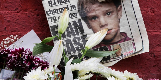 FILE - This May 28, 2012, file photo shows a newspaper with a photograph of Etan Patz that is part of a makeshift memorial in the SoHo neighborhood of New York. Jury selection is set to start Monday, Jan. 5, 2015, in Hernandezâs murder trial. As the murder case surrounding Patz' notorious 1979 disappearance heads to trial, missing-childrenâs advocates see it as proof that such cases still can be pursued after decades. (AP Photo/Mark Lennihan, File)