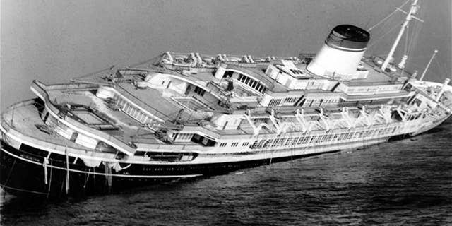 The Andrea Doria keels far over to starboard before sinking to the bottom of the Atlantic in 1956.