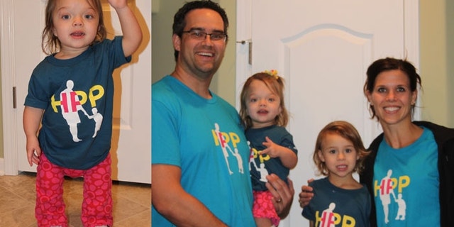 Evie Elsaesser, 2, and her family: Mom Lindsey, father John, and sister Lyla, 4.