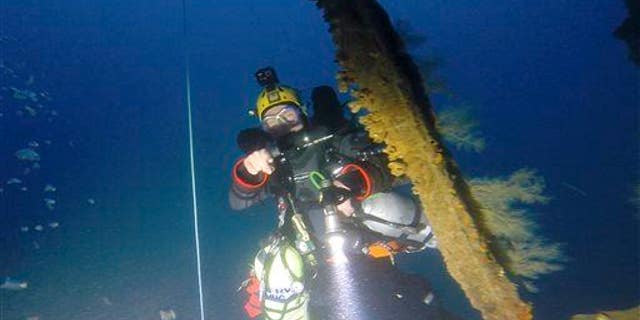 A diver investigates a shipwreck in this file photo.