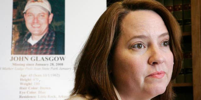 FILE - In this Feb. 19, 2008, file photo, Melinda Glasgow, wife of contracting executive John Glasgow, is interviewed in North Little Rock, Ark. The remains of John Glasgow, who went missing in 2008, have been found in Petit Jean State Park. Conway County Sheriff Mike Smith confirmed that hikers found a skull on Wednesday, March 11, 2015, about 150 yards off Red Bluff Drive in the park. (AP Photo/Danny Johnston, File)