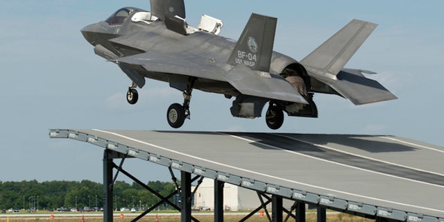 An F-35B performs a successful "ski jump" takeoff.