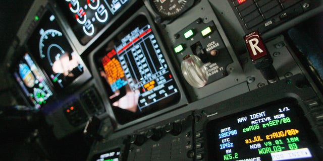 In this Sept. 18, 2008 file photo, navigation controls are seen in the cockpit of a FAA Gulfstream jet at a hangar at Washington's Reagan National Airport.