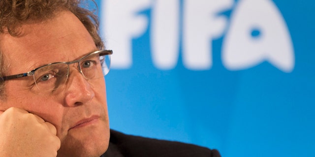 FILE - In this Thursday, Jan. 23, 2014 file photo FIFA Secretary General Jerome Valcke listen to questions during a news conference to present the new world cup song at the Maracana stadium in Rio de Janeiro, Brazil. FIFA's ethics investigator Cornel Borbely recommended Tuesday Jan. 5, 2016 a 9-year ban for suspended secretary general Jerome Valcke. (AP Photo/Felipe Dana, File)