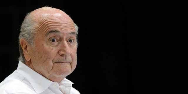 FILE - In this Aug. 22, 2015 file photo then FIFA President Sepp Blatter speaks during a news conference in Ulrichen, Switzerland. The FIFA ethics committee said Friday, Sept. 9, 2016 it opened formal proceedings against Blatter, former secretary general Jerome Valcke and former finance director Markus Kattner over million-dollar payments in their contracts â some of which were approved by other senior FIFA officials. (Laurent Gillieron/Keystone via AP, file)