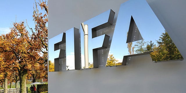 ZURICH, SWITZERLAND - OCTOBER 20: The FIFA logo is seen outside the FIFA headquarters prior to the FIFA Executive Committee Meeting on October 20, 2011 in Zurich, Switzerland. During their third meeting of the year, held over two days, the FIFA Executive Committee will approve the match schedules for the FIFA Confederations Cup Brazil 2013 and the 2014 FIFA World Cup Brazil. (Photo by Harold Cunningham/Getty Images)