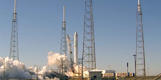 All nine liquid oxygen and kerosene-burning engines fired at once during SpaceX's "static fire test" on Launch Complex 40 at the U.S. Air Force Station at Cape Canaveral.