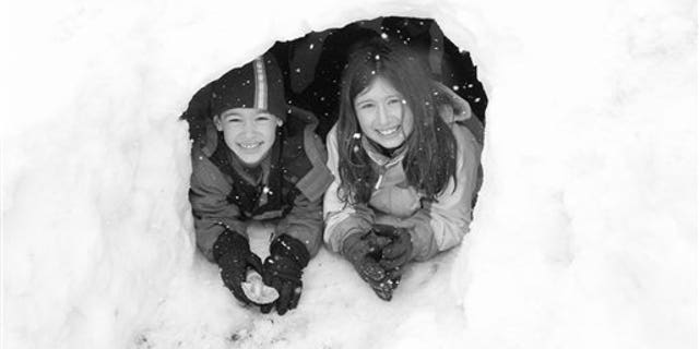 Feb. 26, 2010: Friedlander family photo shows Gregory and Molly Friedlander play in the snow at their home in Cross River, N.Y.