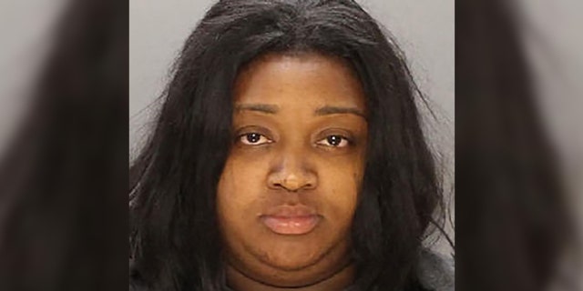Twenty-eight-year-old Latifah Linder was arrested for allegedly throwing grease at three customers.