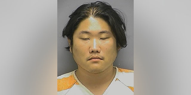 A July 26, 2015 photo provided by the the Frederick County, Md., Sheriff’s Office shows Song Su Kim. Song Su Kim fatally stabbed a South Korean missionary on Monday, July 27, 2015, and seriously wounded his wife at the Anna Prayer Mountain Church Retreat Center, a Christian complex in Urbana, authorities said Monday. Kim, 30, of Falls Church, Virginia, was charged in Frederick County, Maryland, with first- and second-degree murder, first- and second-degree attempted murder and two counts of assault. (Frederick County, Md., Sheriff’s Office via AP)