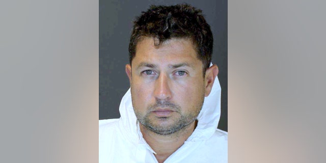 In this undated photo provided by the Suffolk County Police Department, real estate executive Sean Ludwick is shown. A spokesman for the Suffolk County district attorney says that Lidwick, who is facing vehicular homicide and drunken driving charges over a fatal crash in the Hamptons, was apprehended by federal authorities in Puerto Rico after trying to flee to South America. (Suffolk County Police Department via AP)