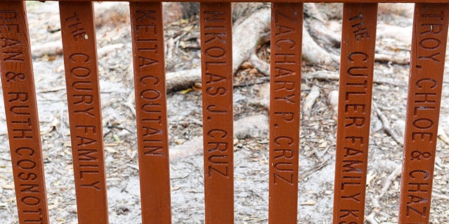 This is the fence with Nikolas Cruz's name before city officials removed his name following the Valentine's Day shooting.